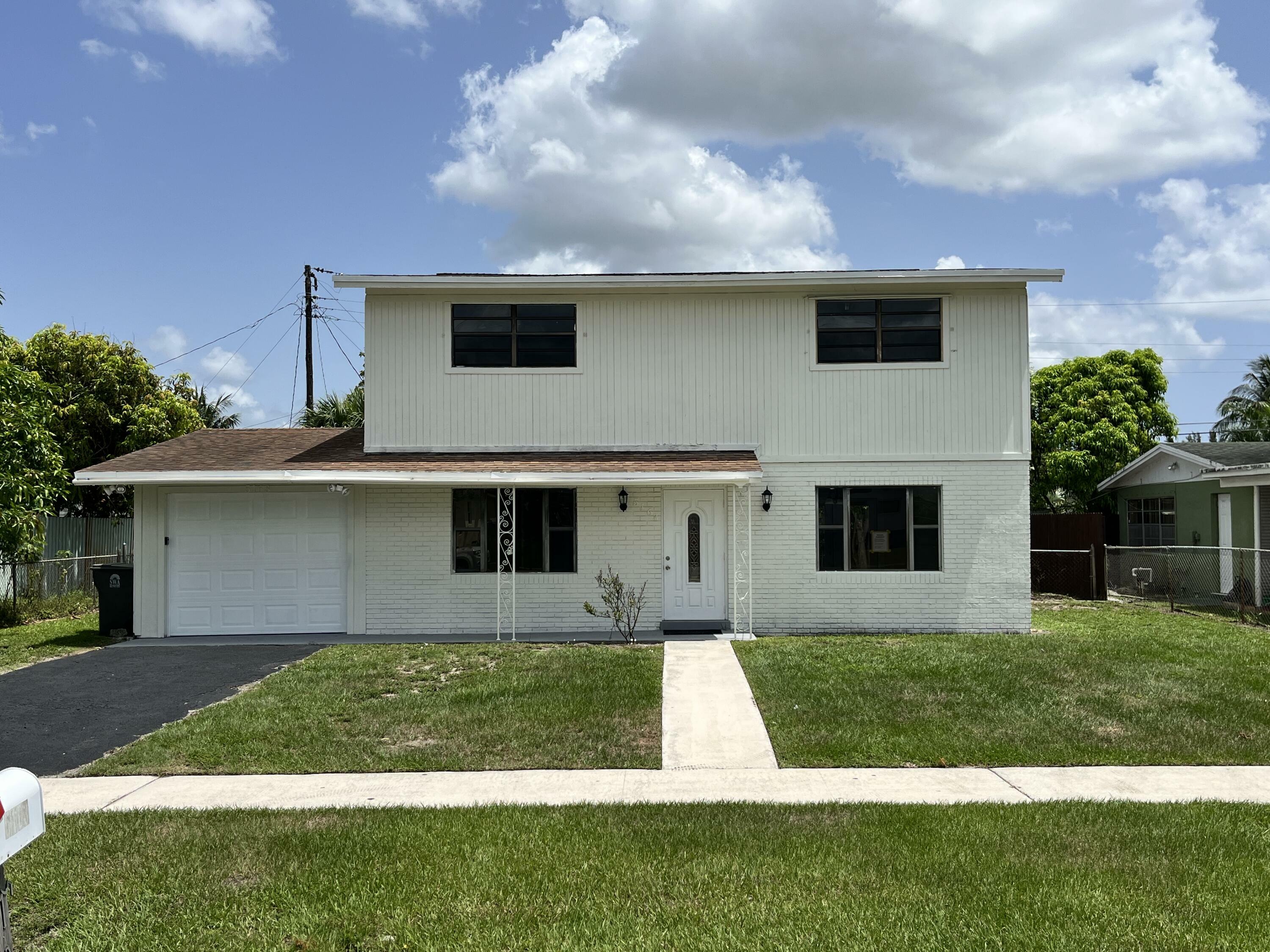 Property Photo: 5163 Marion Place FL 33407