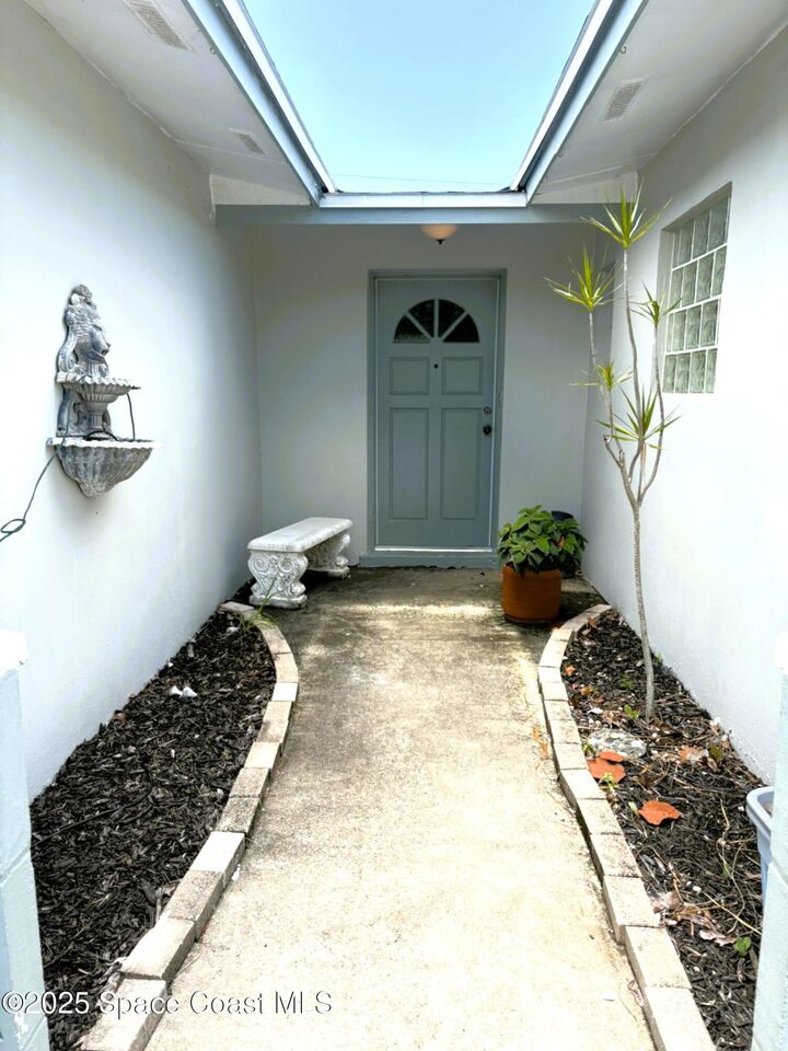 Property Photo:  292 Pine Tree Drive  FL 32903 