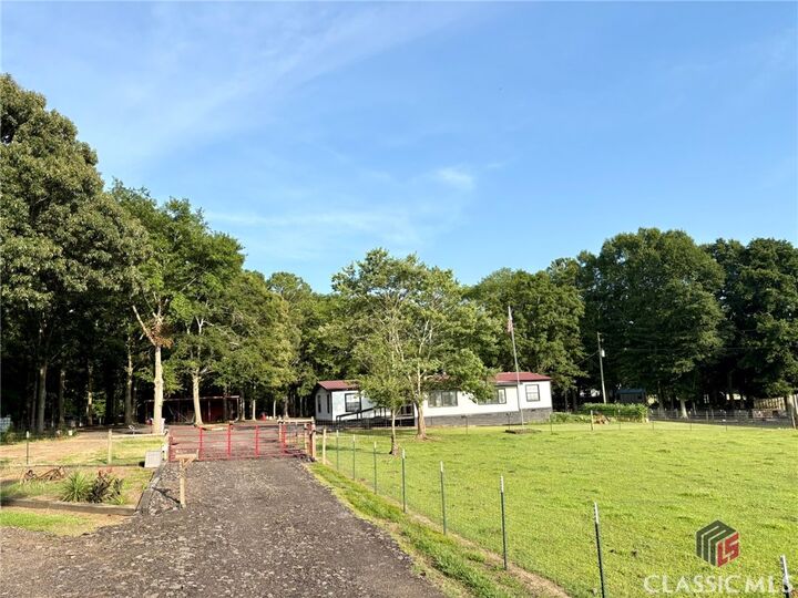 Property Photo:  1368 Jot Em Down Road  GA 30633 
