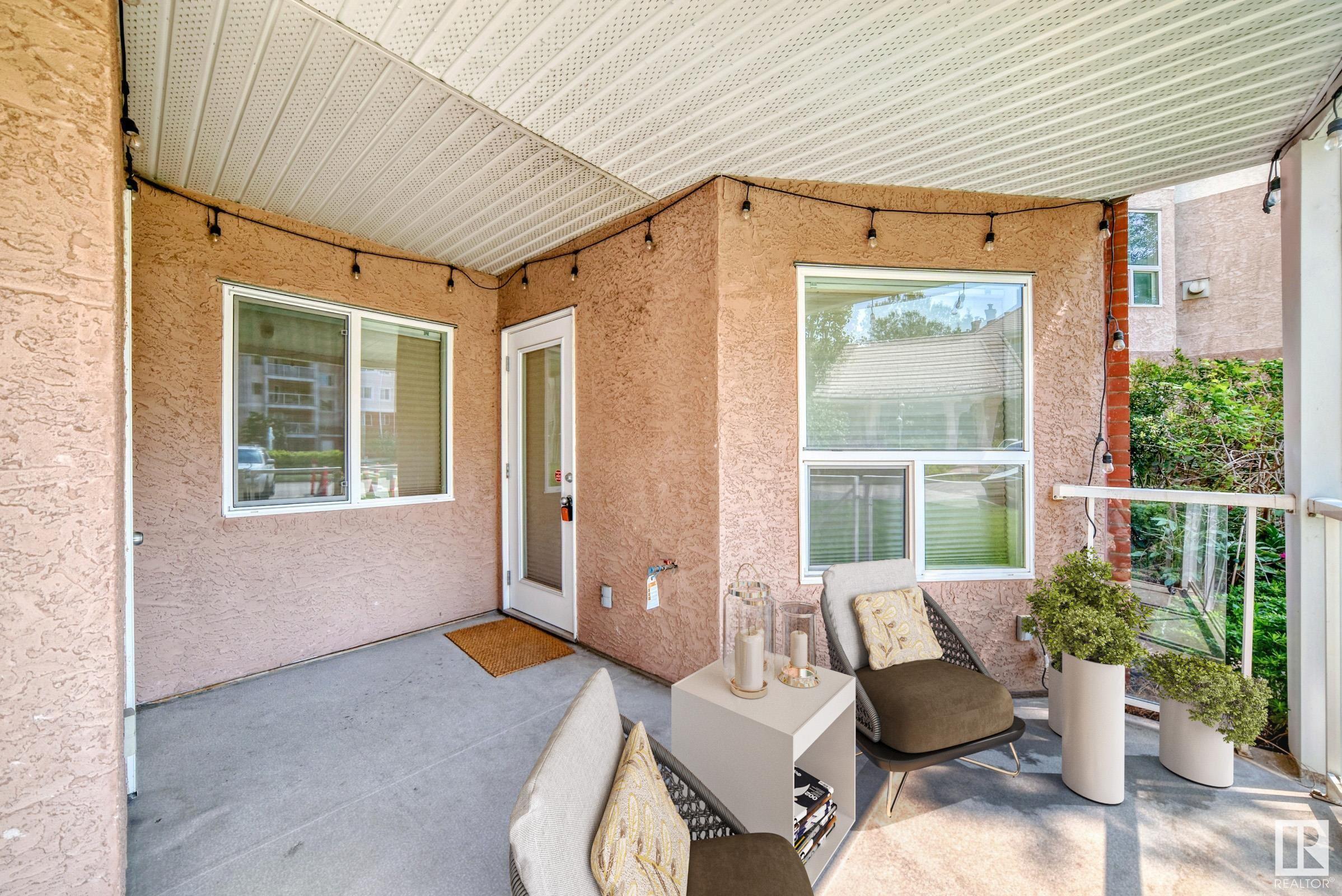 Property Photo: 9008 99 Avenue NW 102 AB T5H 4M6