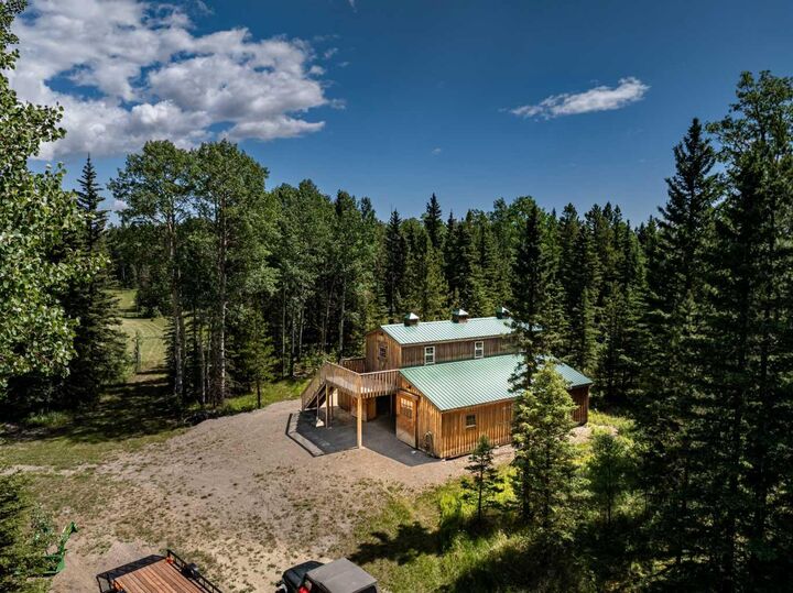 Property Photo:  282155 Range Road 53  AB T4C 1A7 