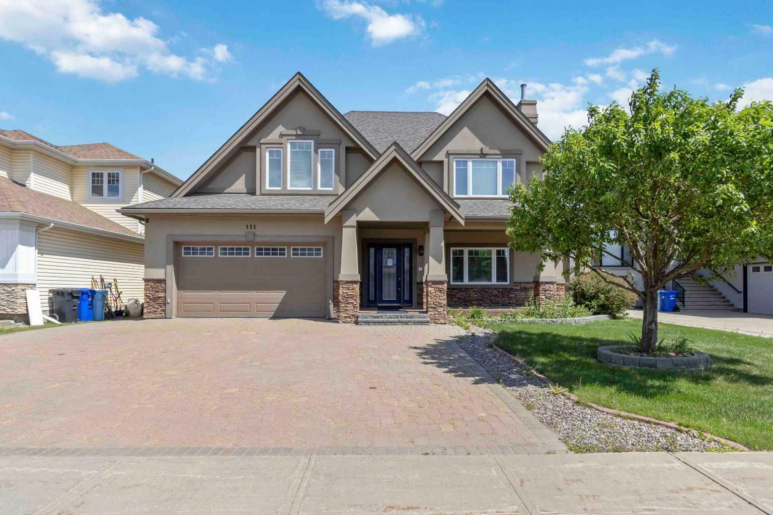 Property Photo: 151 Wild Rose Street AB T9K 0G7