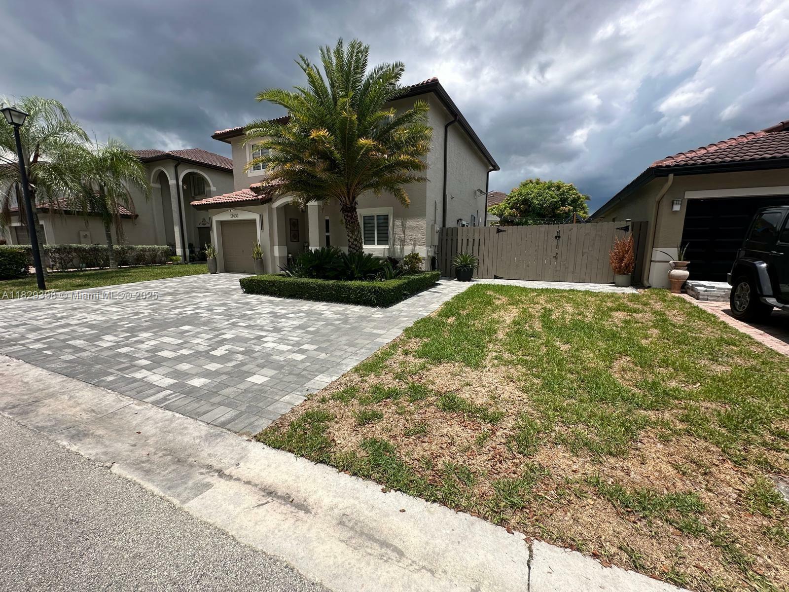 Property Photo: 13430 SW 118th Pl FL 33186