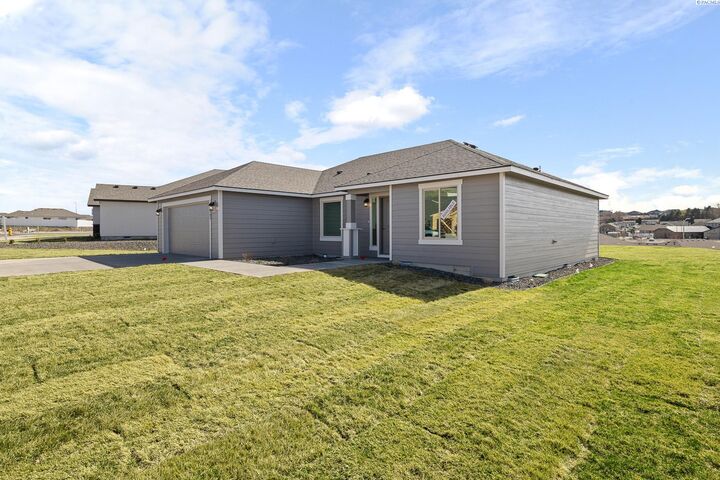 Property Photo:  6563 W 30th Pl  WA 99338 