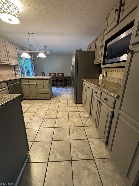Property Photo: 420 Logan Court NC 27021