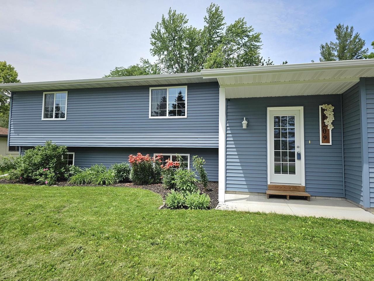 Property Photo:  1209 East 15th Street  WI 54449 