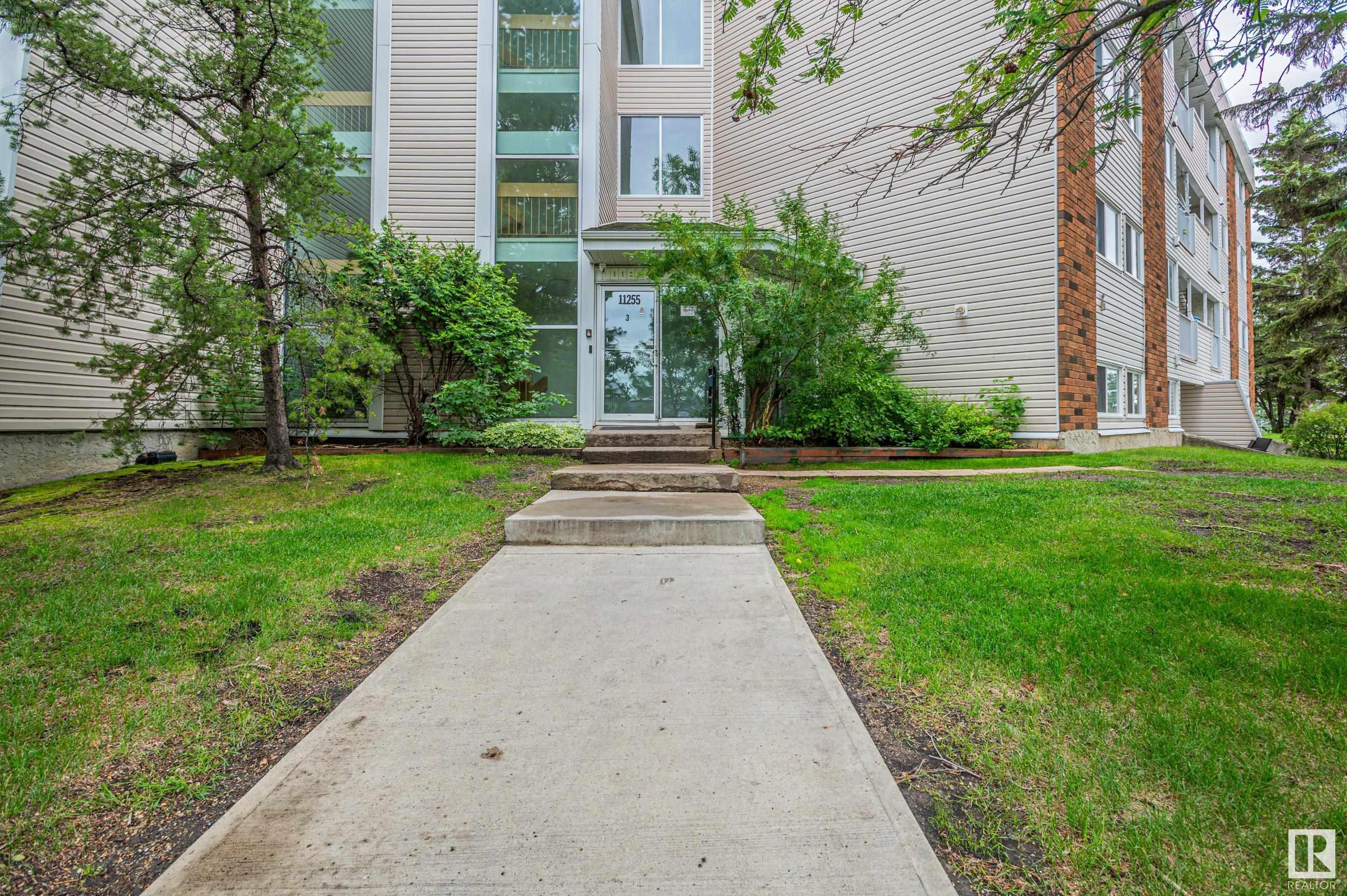 Property Photo: 11255 31 Avenue NW 8 AB T6J 3V6