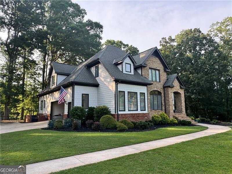 Property Photo: 6685 Driskell Road GA 30041