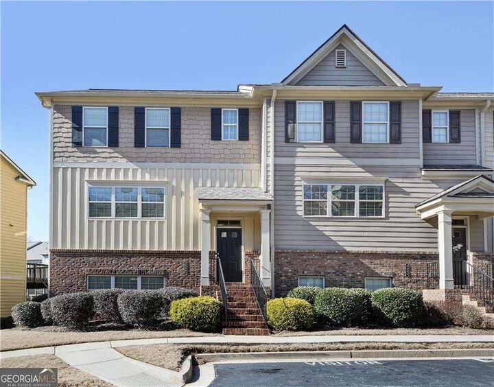 Property Photo: 3898 High Dove Way SW 12 GA 30082