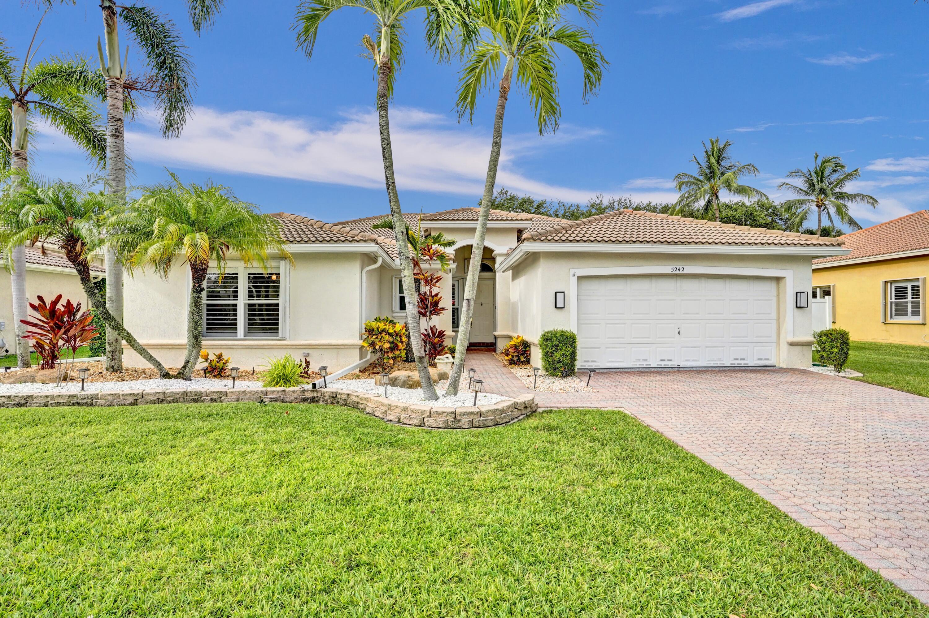Property Photo: 5242 Indianwood Village Lane FL 33463