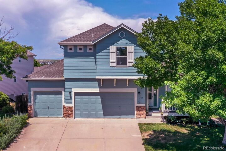 Property Photo: 12535 S Beaver Creek Way CO 80134
