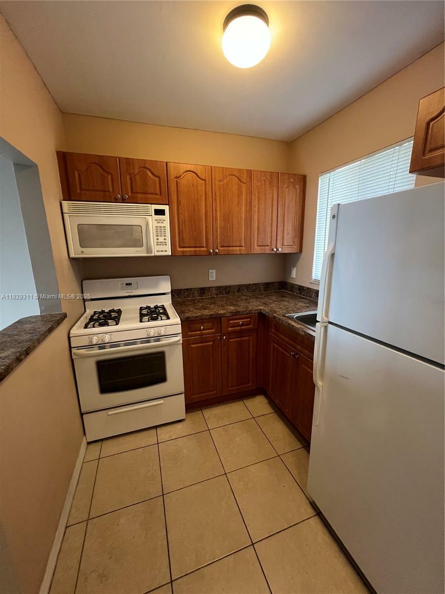 Property Photo:  14500 SW 88th Ave 245  FL 33176 