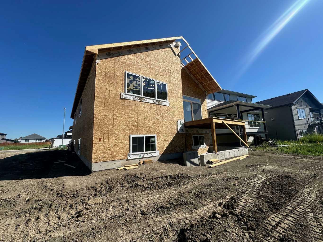Property Photo: 1612 Sixmile View S AB T1K 8J2