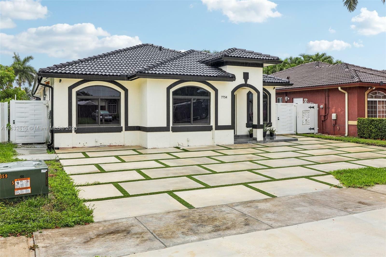 Property Photo: 7754 NW 201st Ter FL 33015