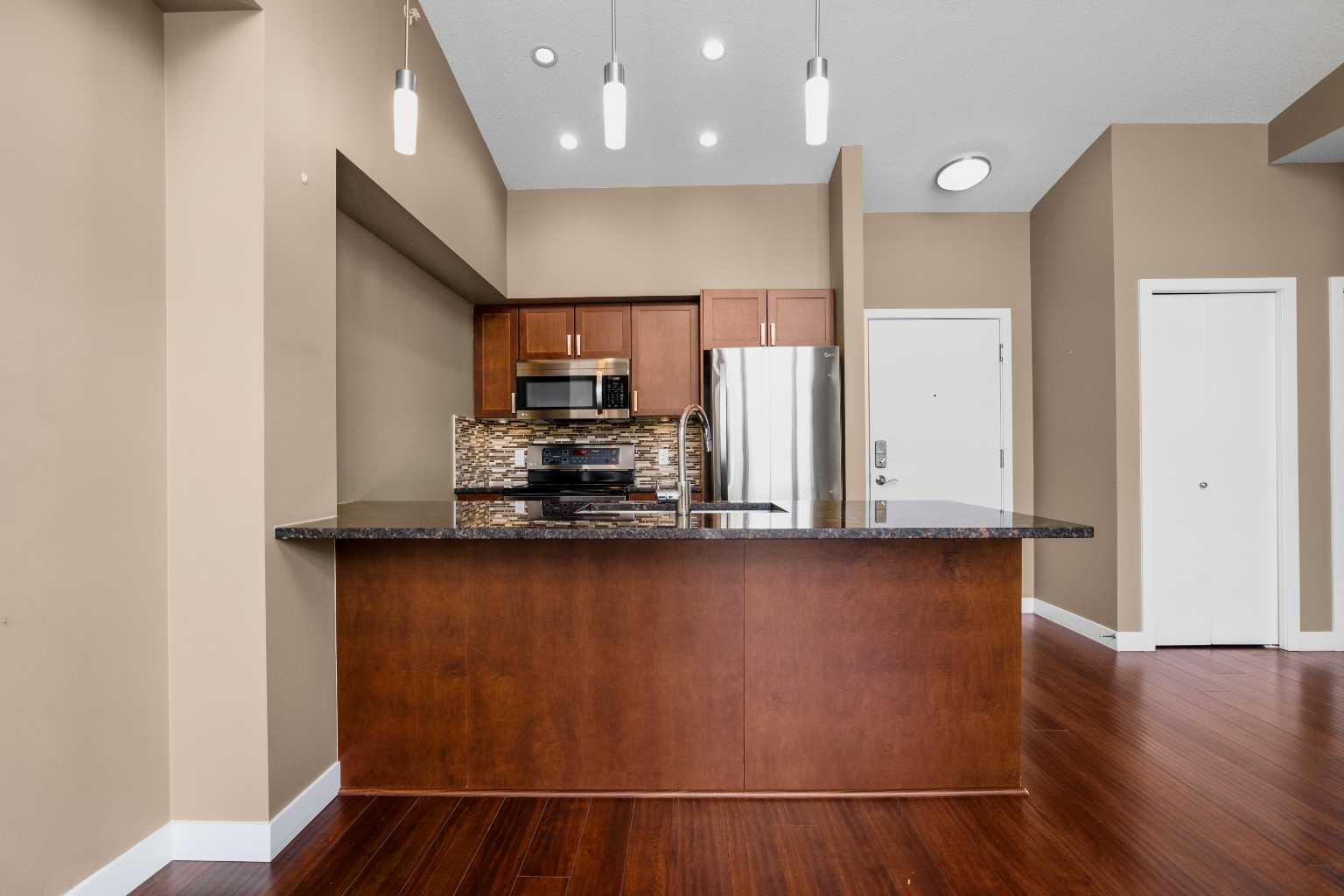 Property Photo: 4303 1 Street NE 409 AB T2E 7M3