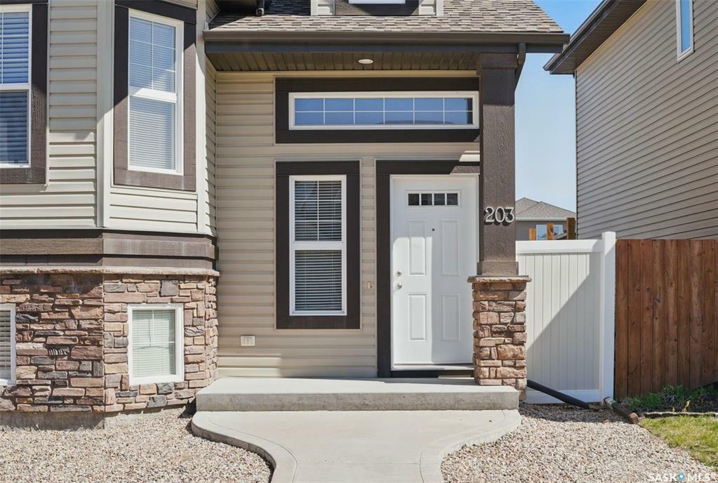 Property Photo: 203 Langlois Way SK S7T 0K8