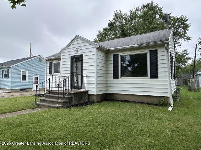 Property Photo:  117 Harriet Avenue  MI 48917 