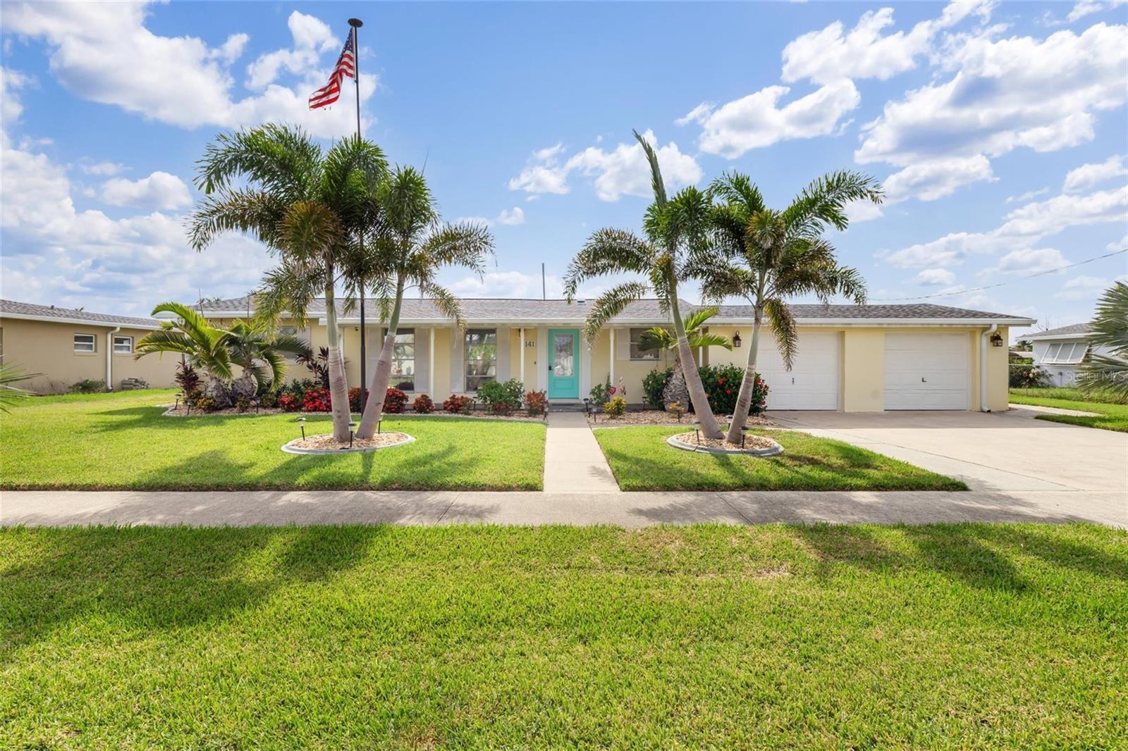 Property Photo: 141 Baldwin Court SE FL 33952