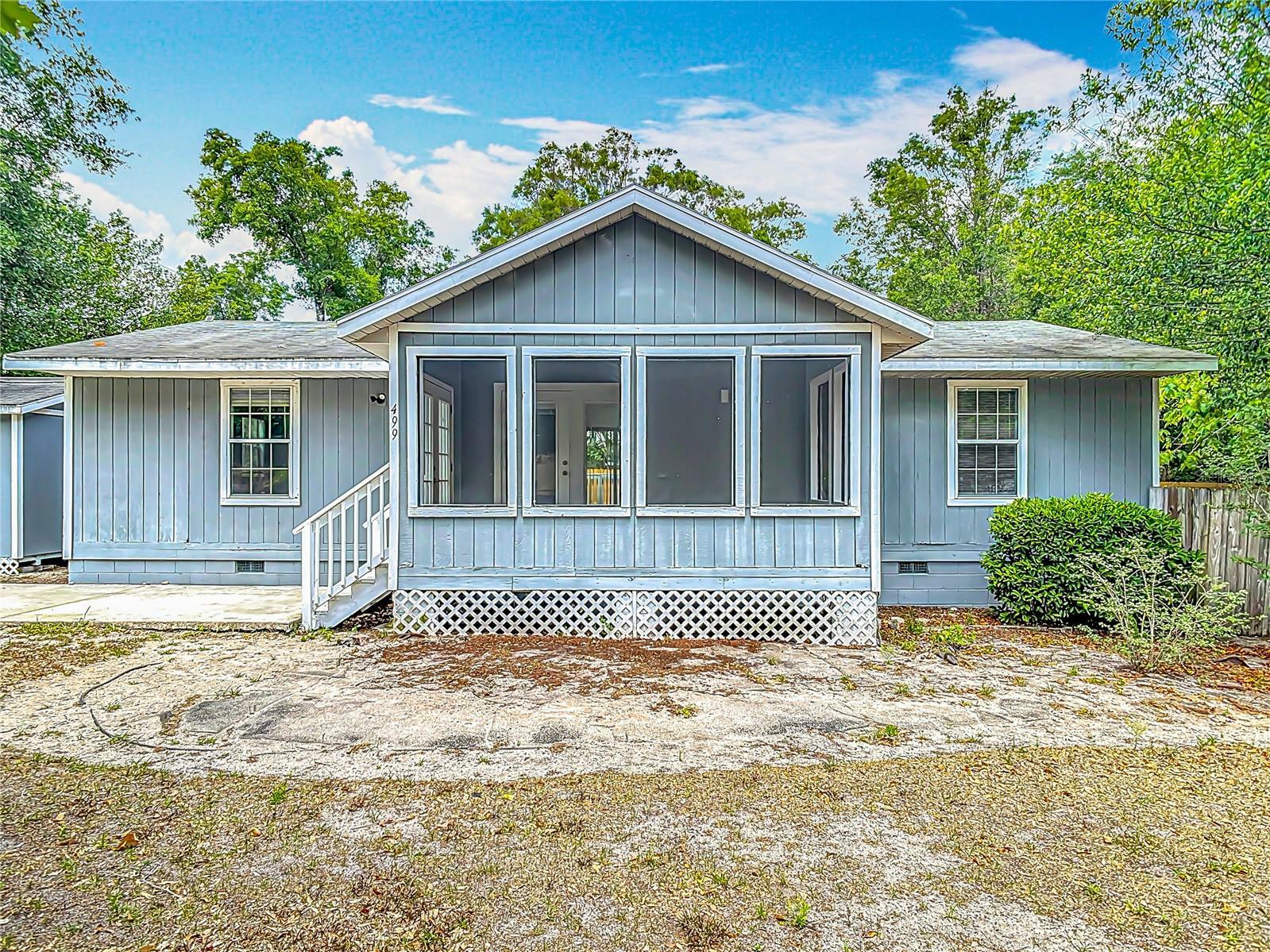 Property Photo: 499 W Beresford Road FL 32720