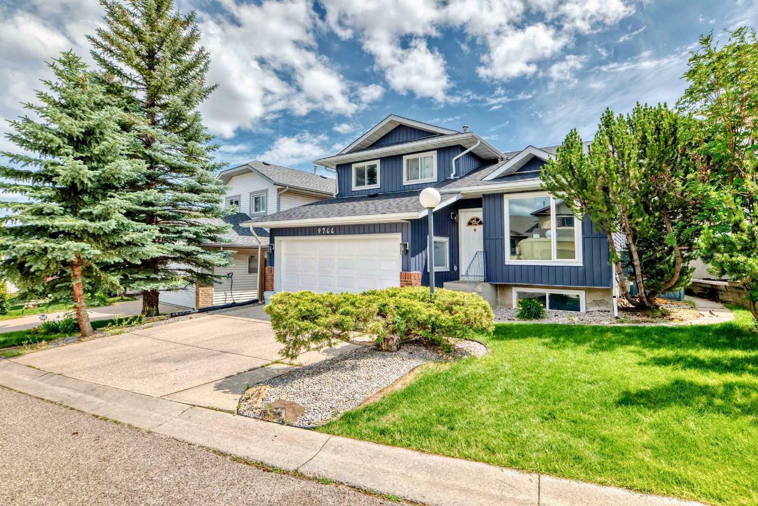 Property Photo: 9744 Sanderling Way NW AB T3K 3R8