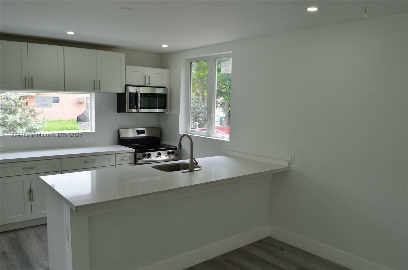 Property Photo: 1998 NW 50th St FL 33142