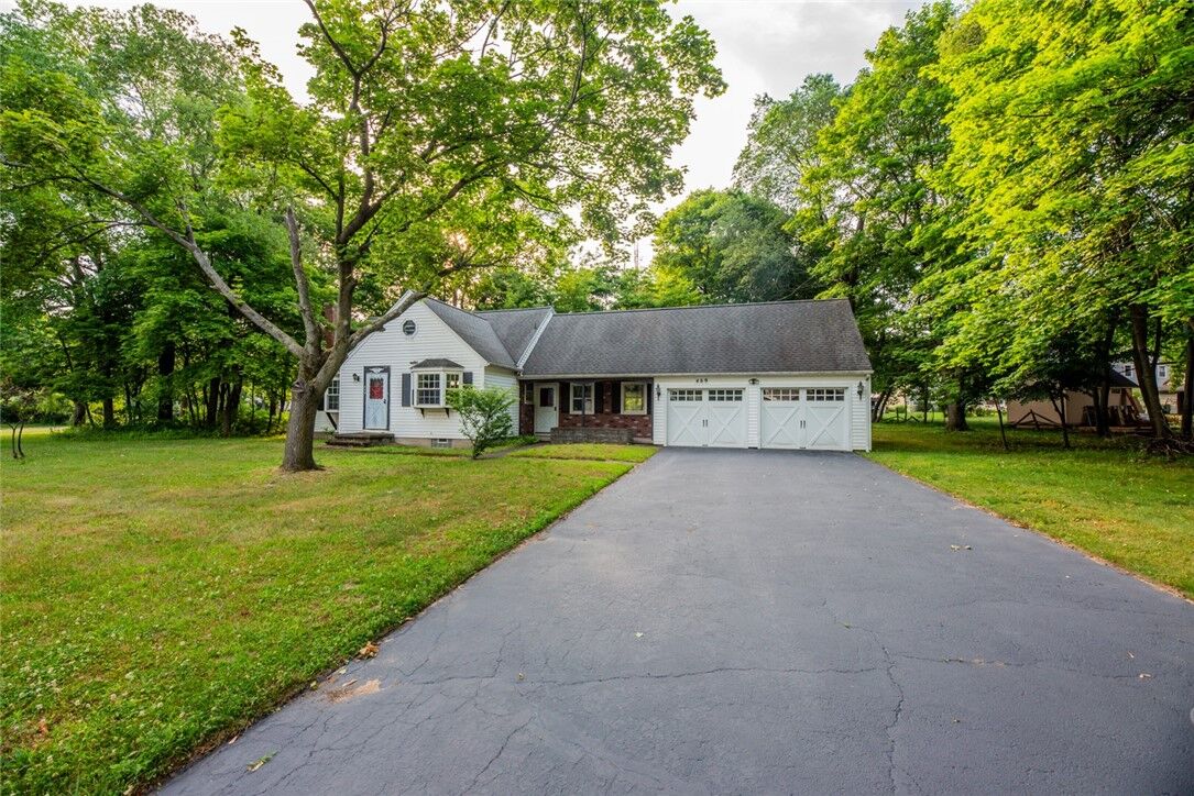 Property Photo: 469 Covewood Boulevard NY 14580