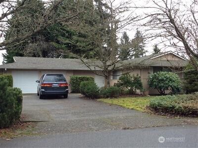 Property Photo:  1212  169 Place NE  WA 98008 