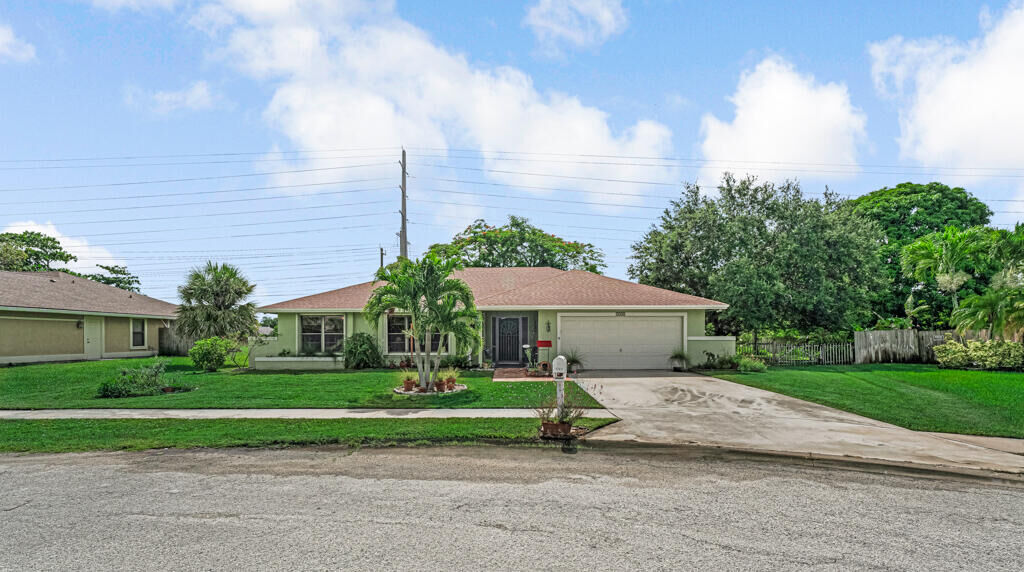 Property Photo: 1743 Shower Tree Way FL 33414