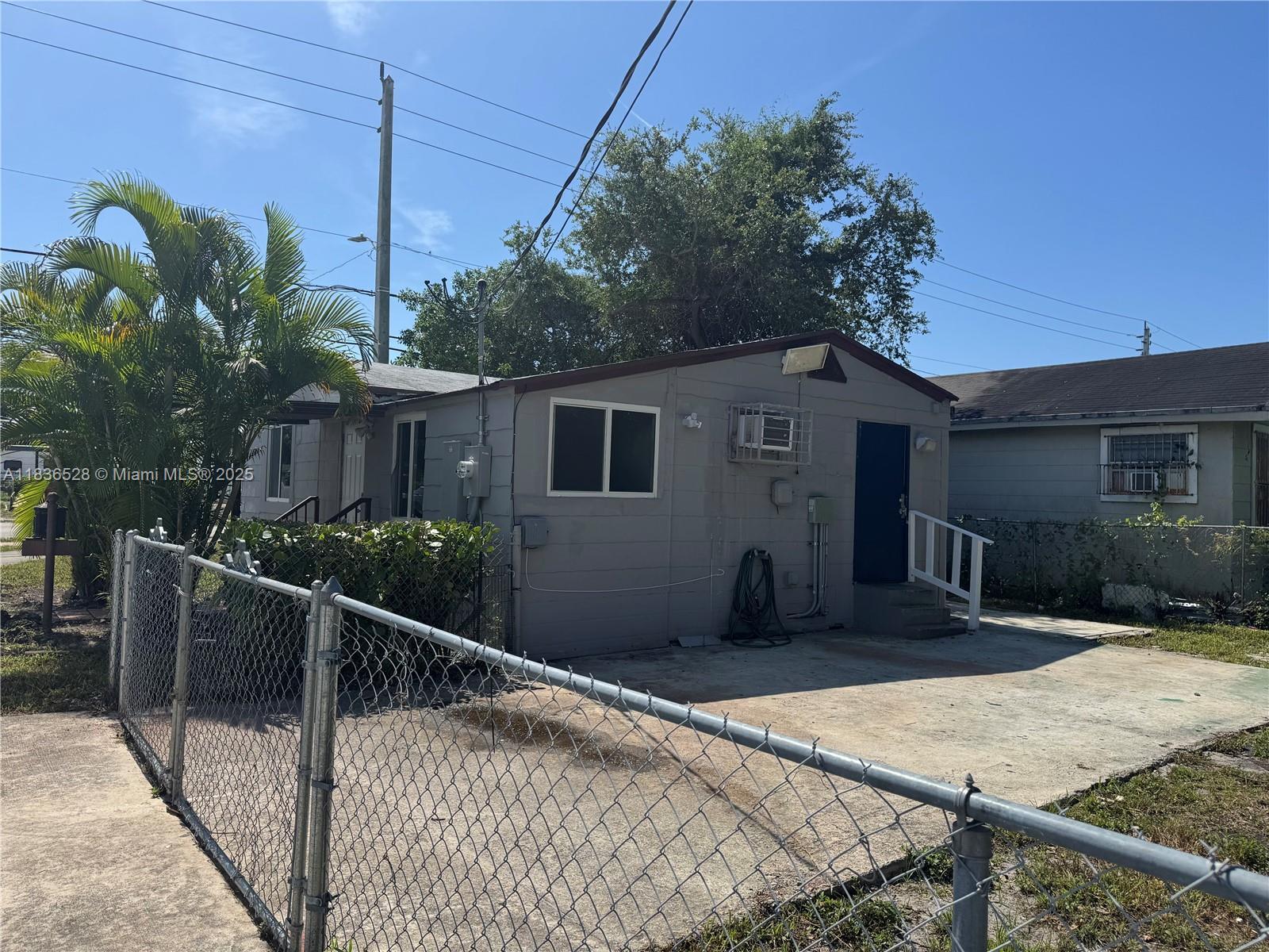 Property Photo: 1104 NW 64th St FL 33150