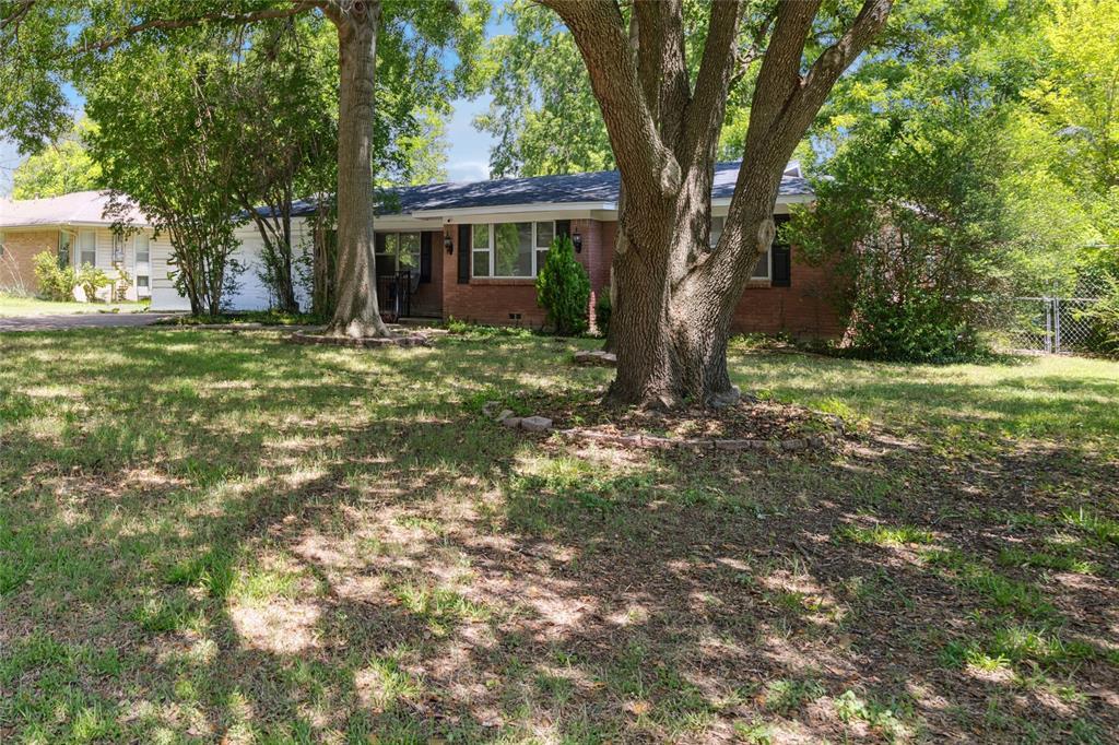 Property Photo: 713 Plaza Drive TX 76140