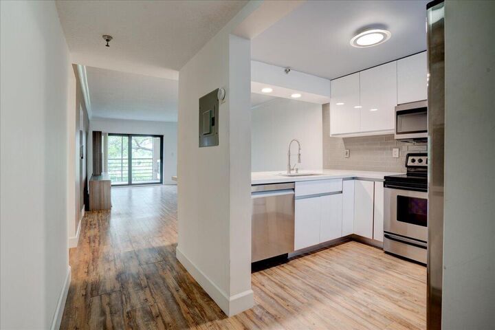 Property Photo:  9235 SW 8th Street 307  FL 33428 