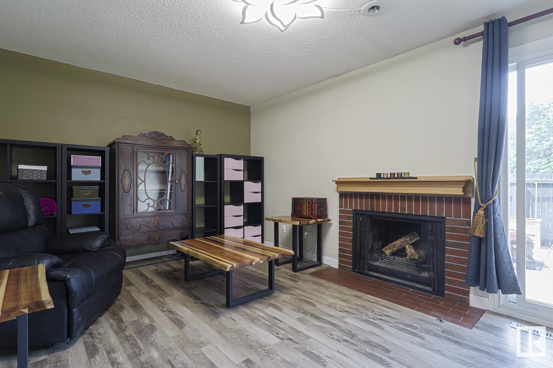 Property Photo:  12056 25 Avenue NW  AB T6J 4L3 