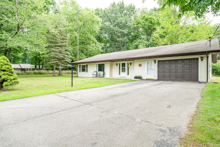 Property Photo:  5081 Woodward Avenue  MI 49038 