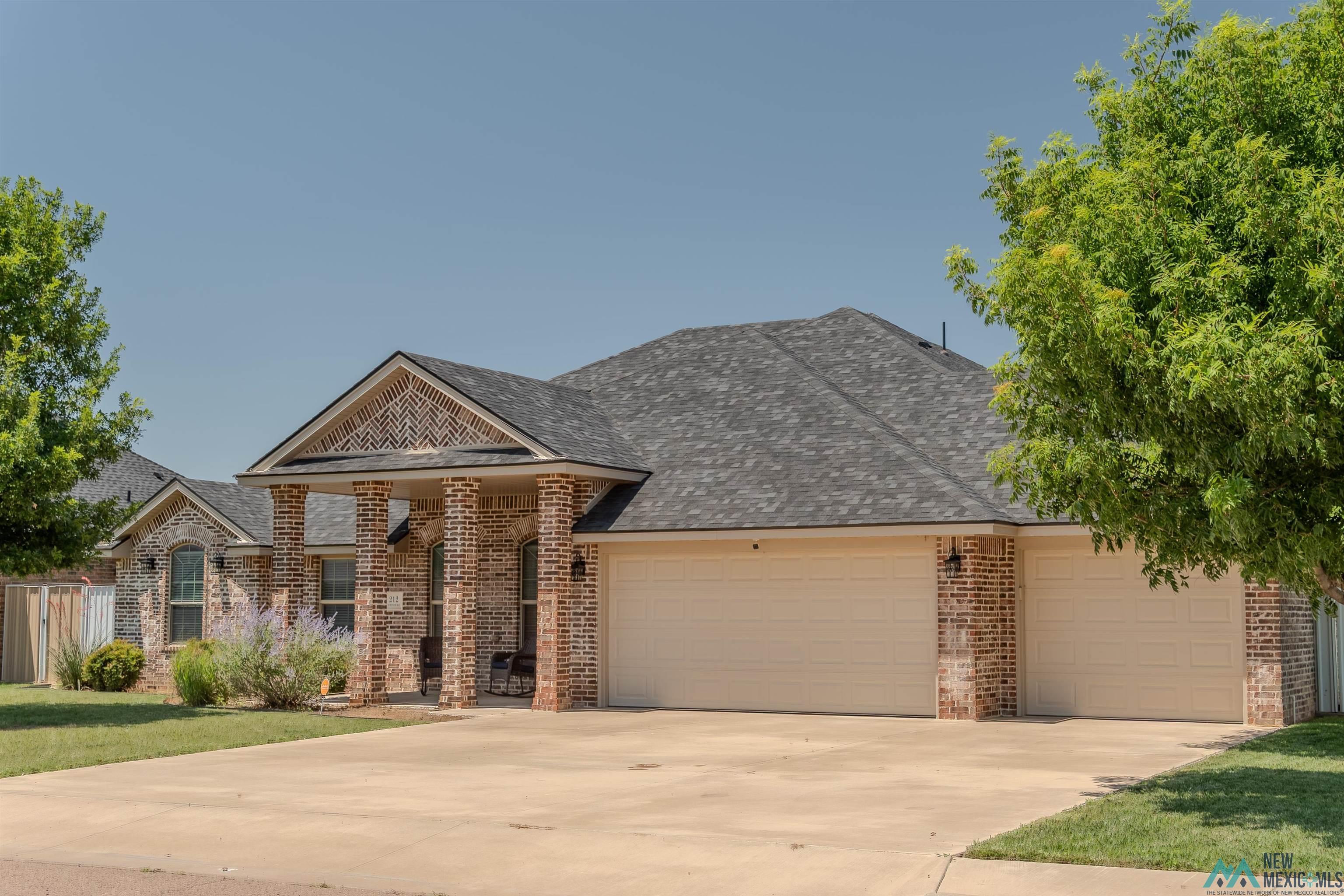 Property Photo: 212 Dominion Way NM 88101