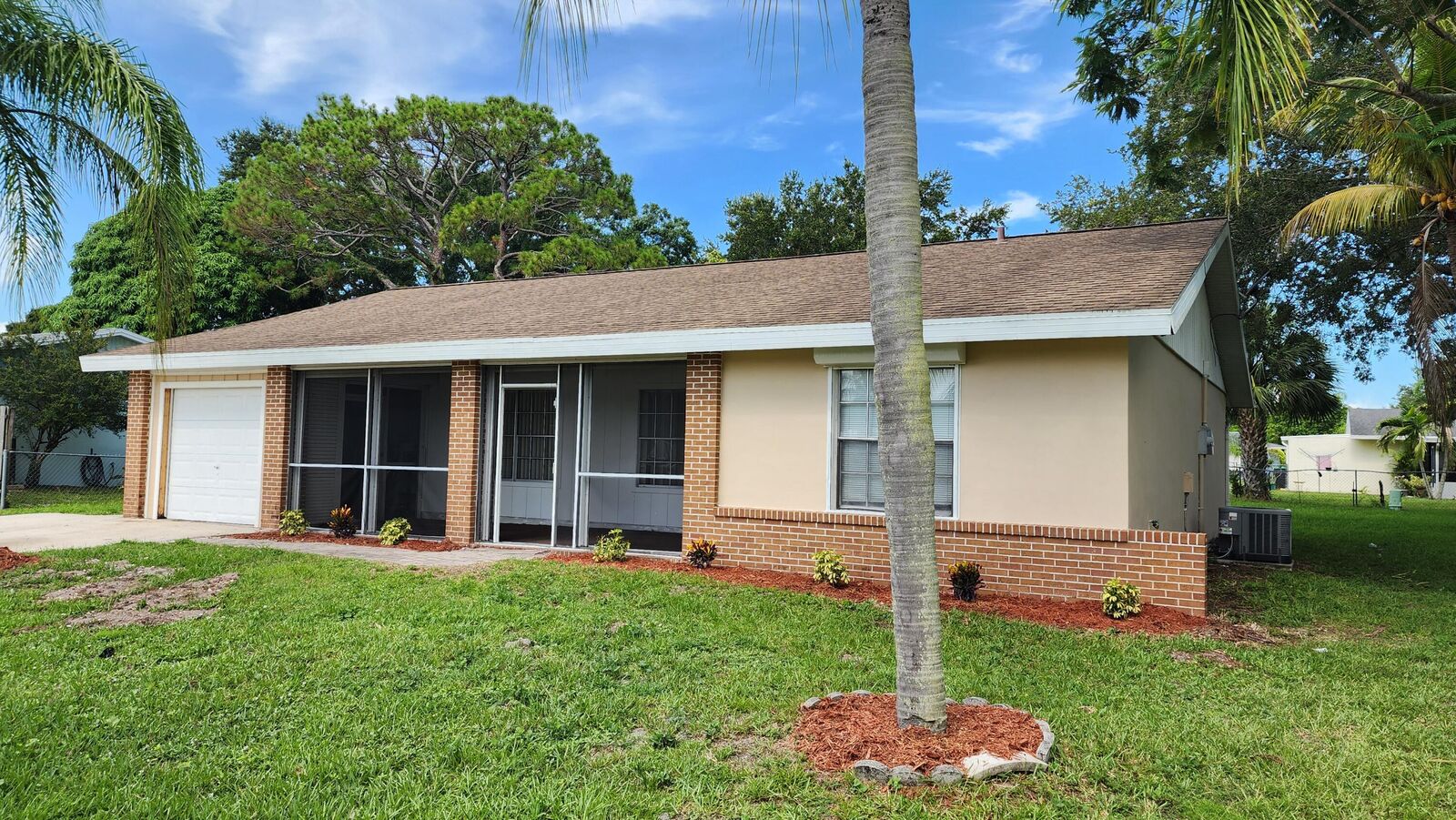 Property Photo:  342 NE Surrey Street  FL 34983 