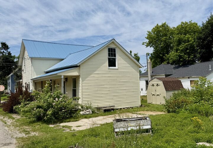 Property Photo:  300 Cass Street  MI 49721 