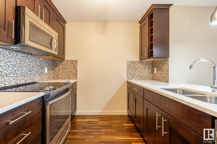 Property Photo:  4008 Savaryn Drive SW 116  AB T6X 2E5 