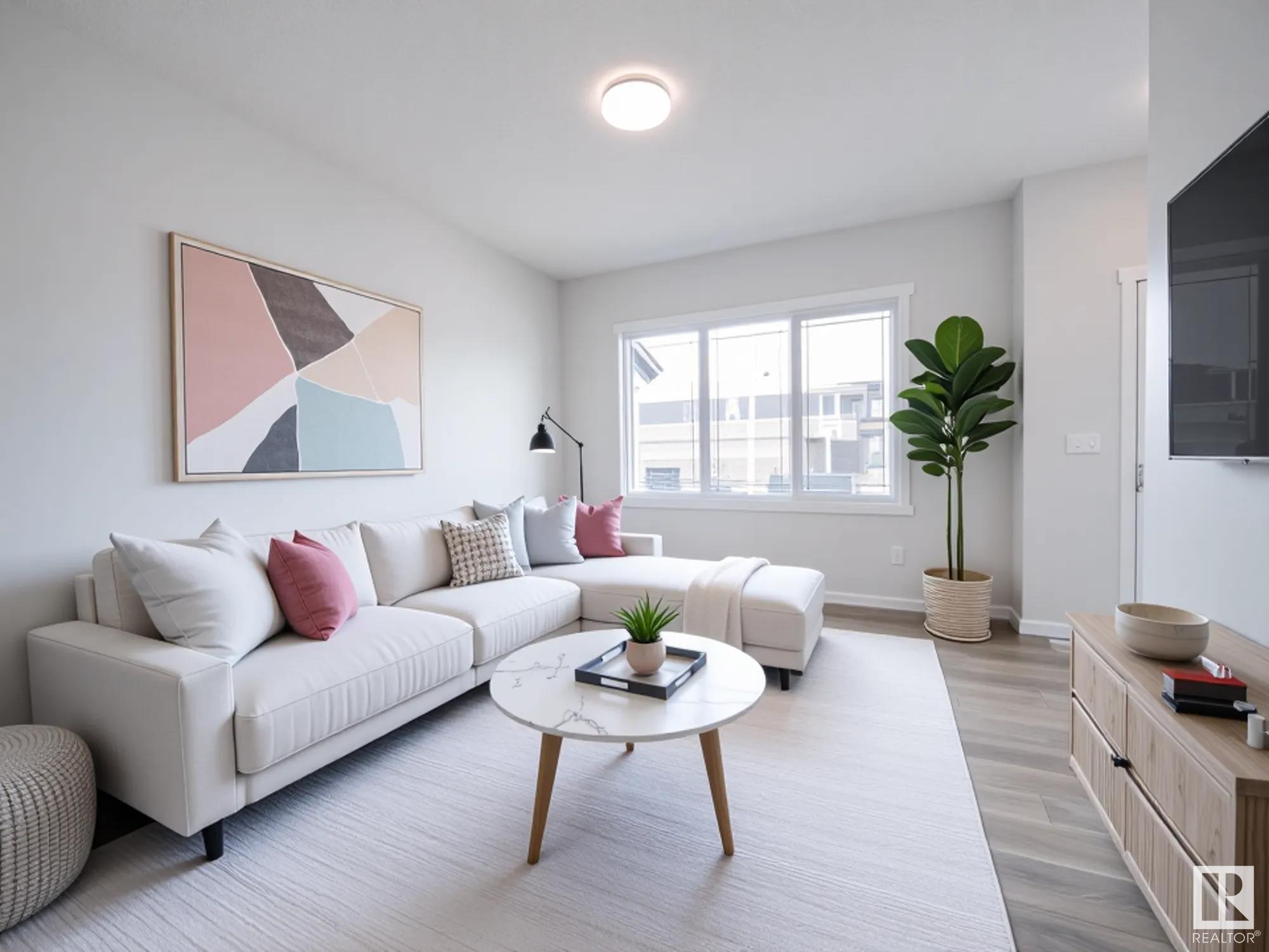 Property Photo:  604 174 Avenue NE  AB T5Y 4G1 