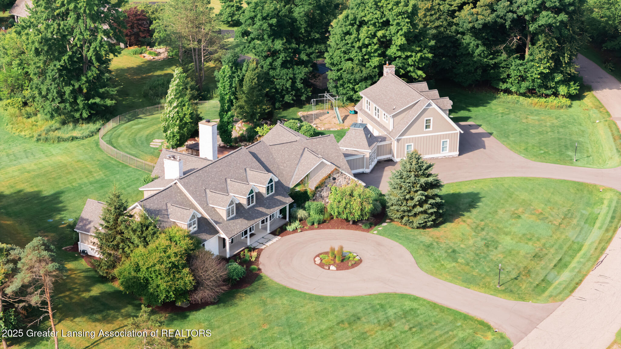 Property Photo:  325 Wind N Wood Drive  MI 48864 