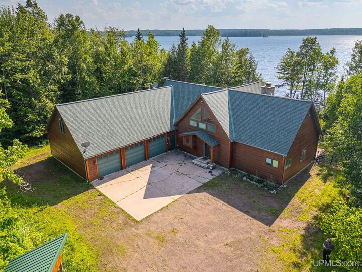 Property Photo:  6448 Lakeshore Drive  MI 49968 