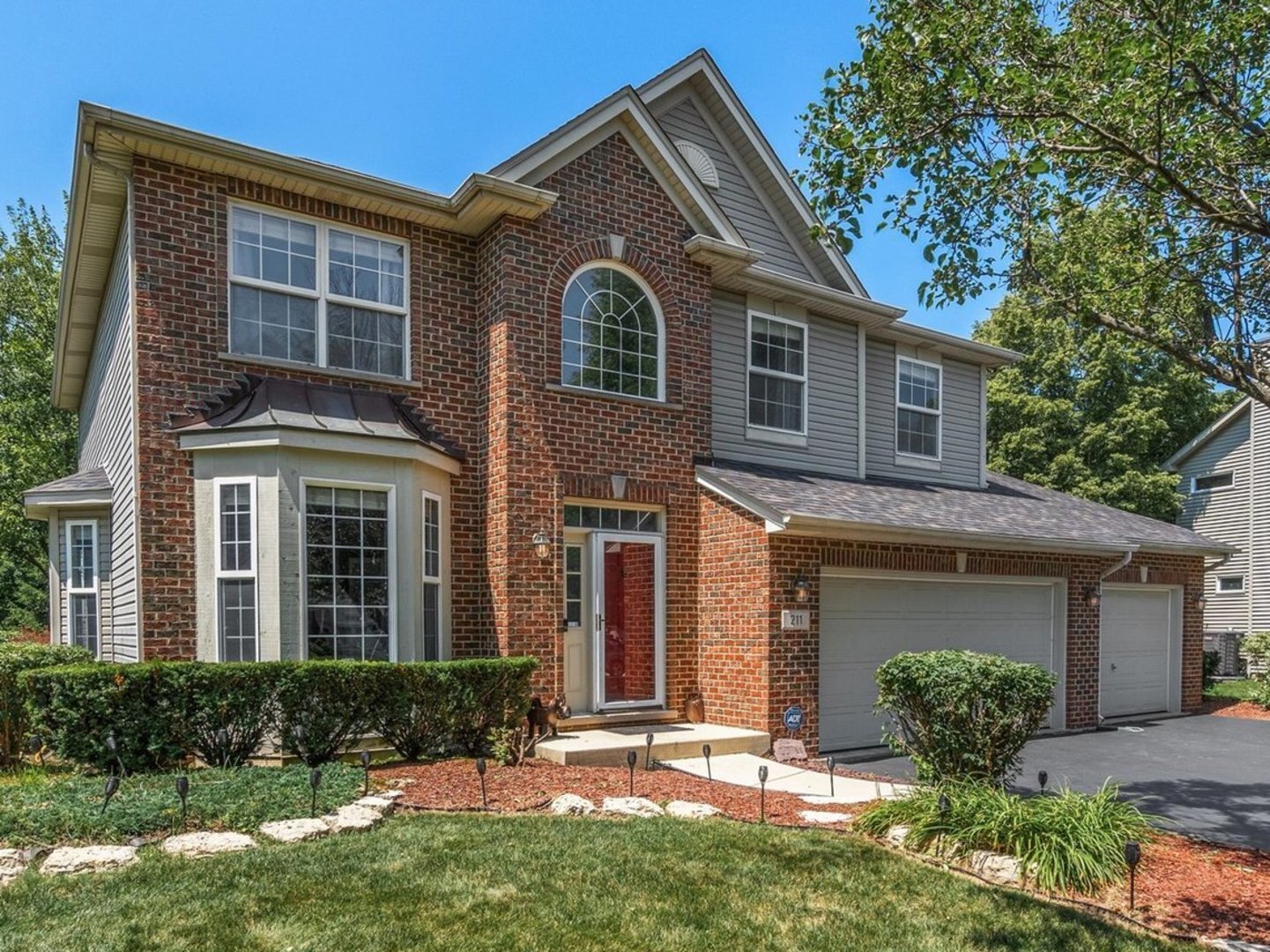 Property Photo:  211 Cambridge Court  IL 60543 