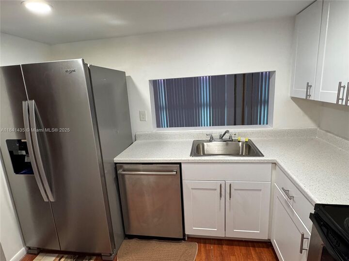 Property Photo:  11780 SW 18th St 321-2  FL 33175 