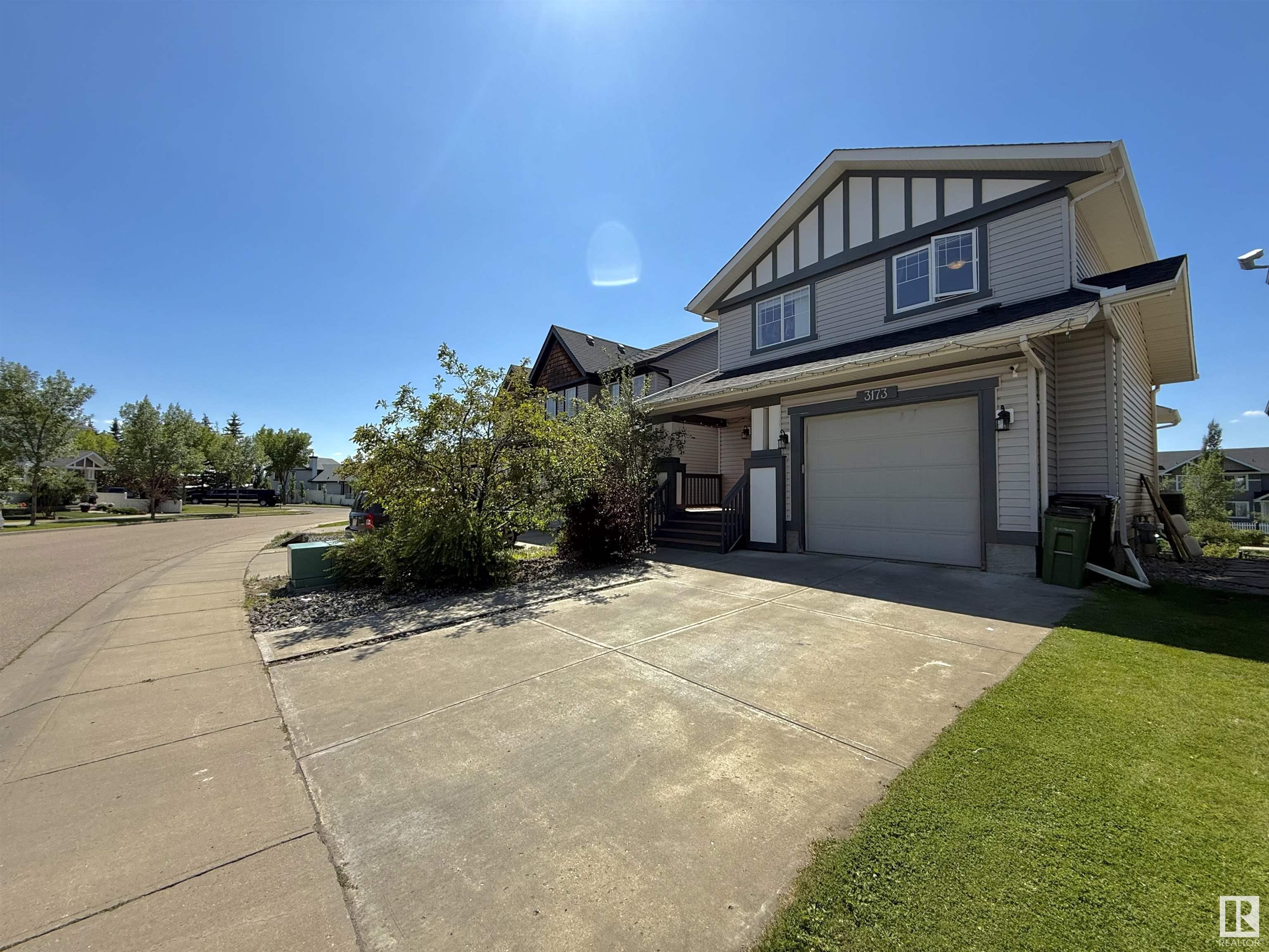 Property Photo: 3173 Trelle Loop NW AB T6R 0A2
