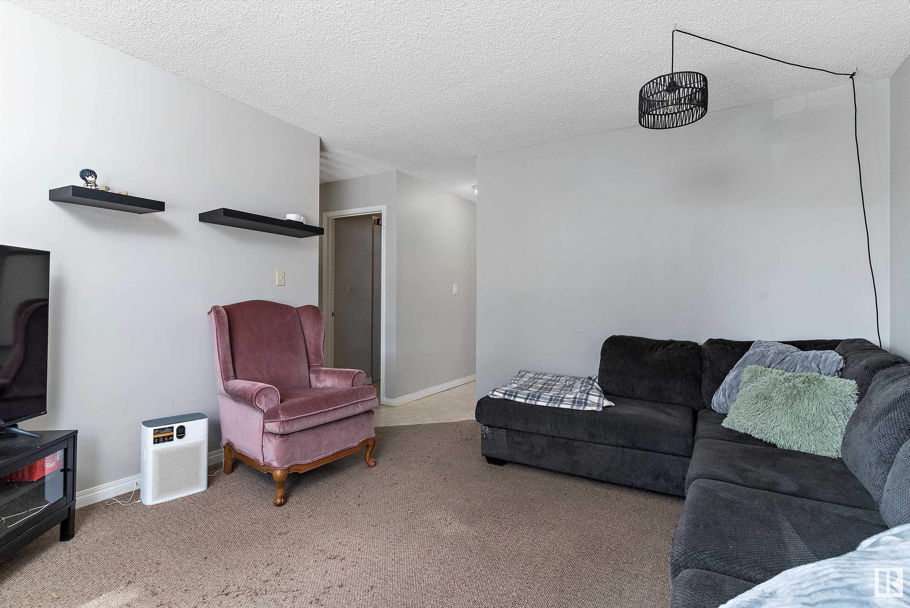 Property Photo:  12004 & 12006 128 Avenue NW  AB T5E 6J5 