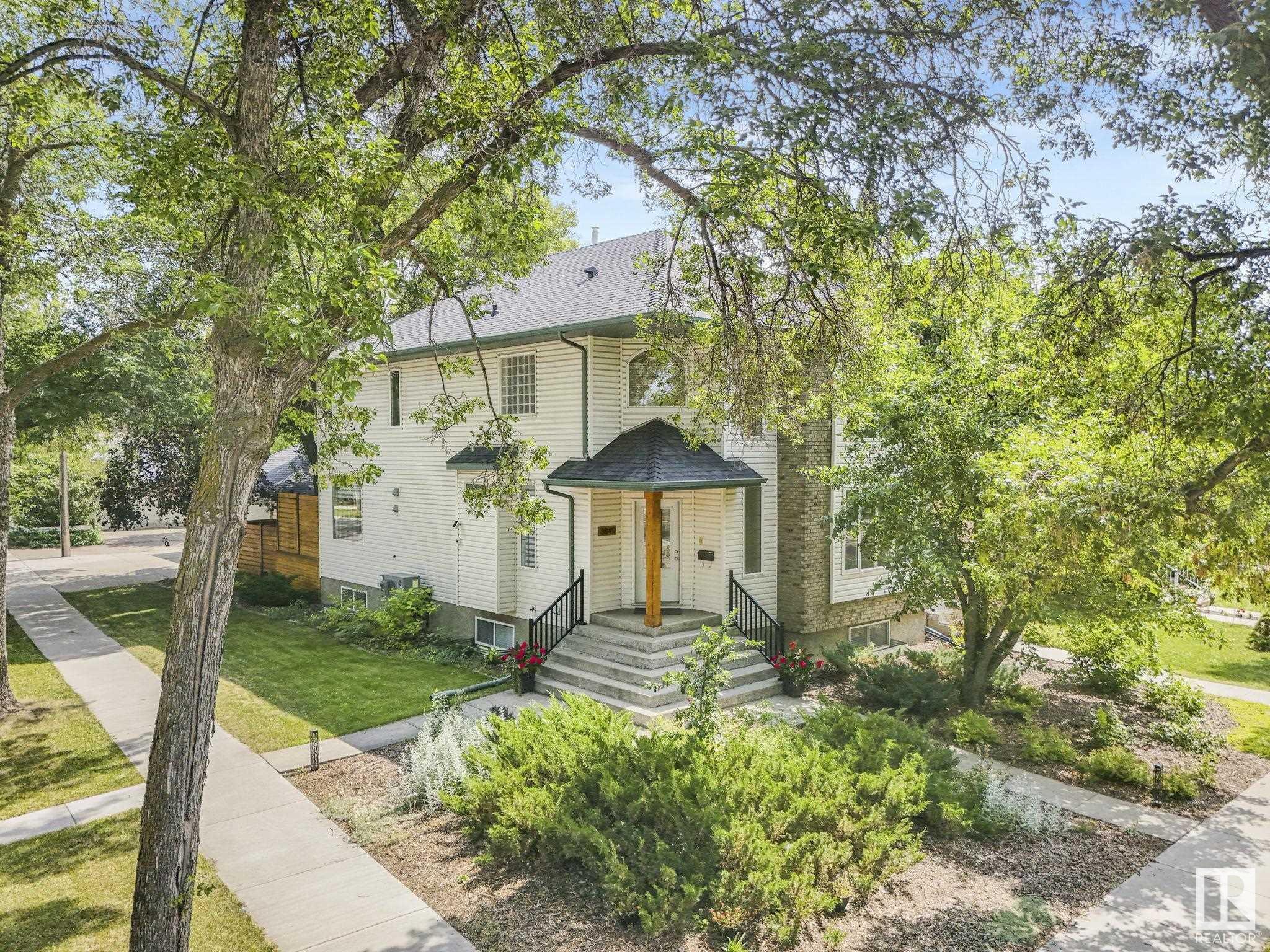 Property Photo:  8849 91 Street NW  AB T6C 3N3 