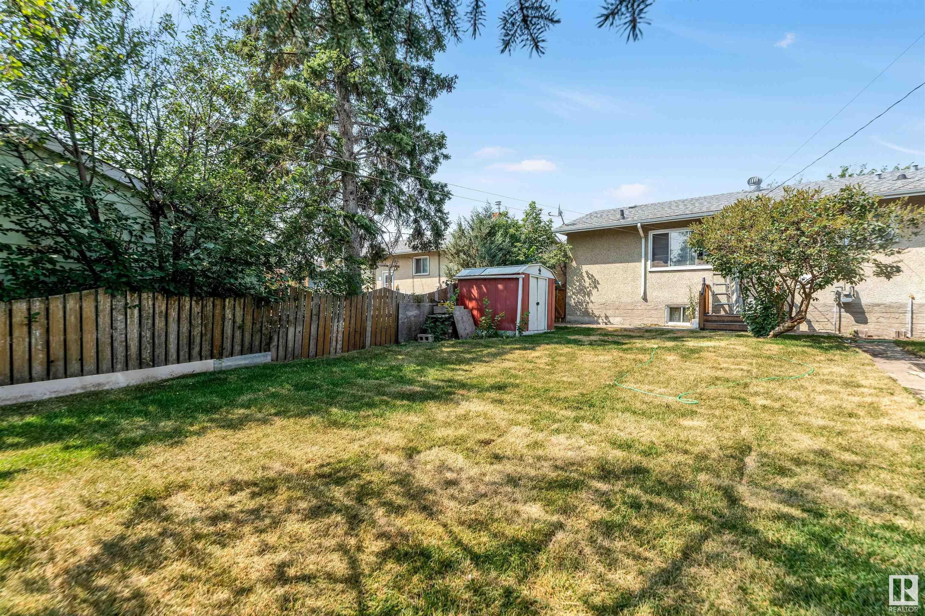 Property Photo:  7323 77 Street NW  AB T6C 3L3 