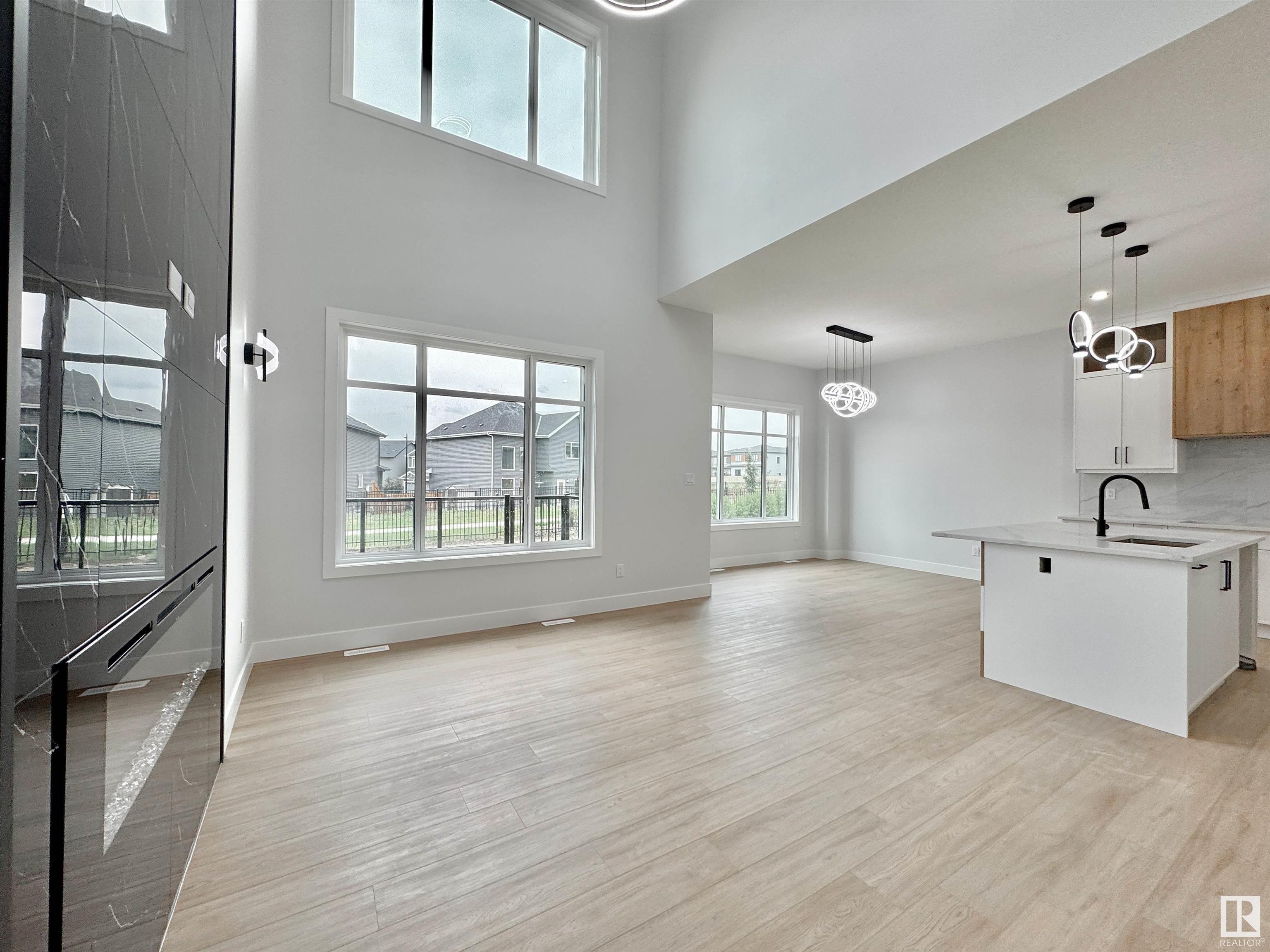Property Photo:  7041 Kiviaq Crescent SW  AB T6W 5R2 