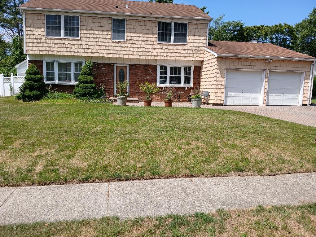 Property Photo:  38 Tulip Grove Drive  NY 11755 