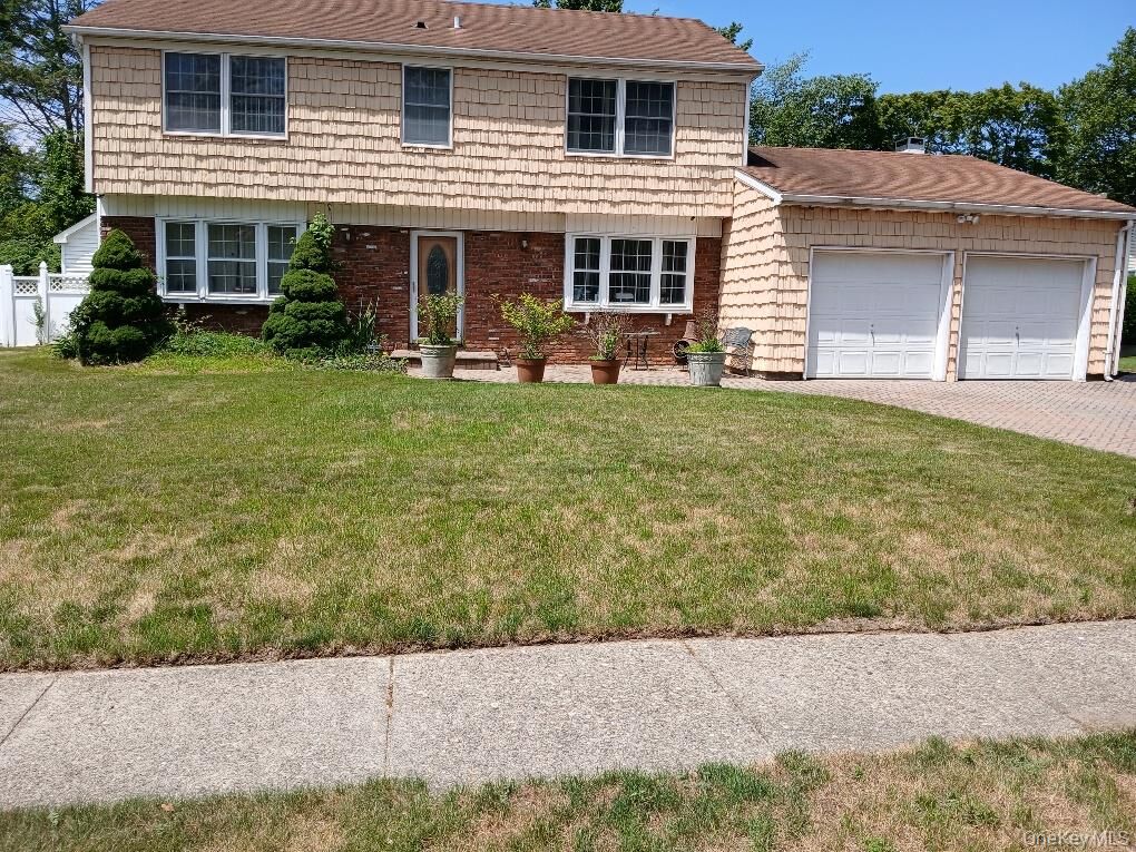 Property Photo: 38 Tulip Grove Drive NY 11755