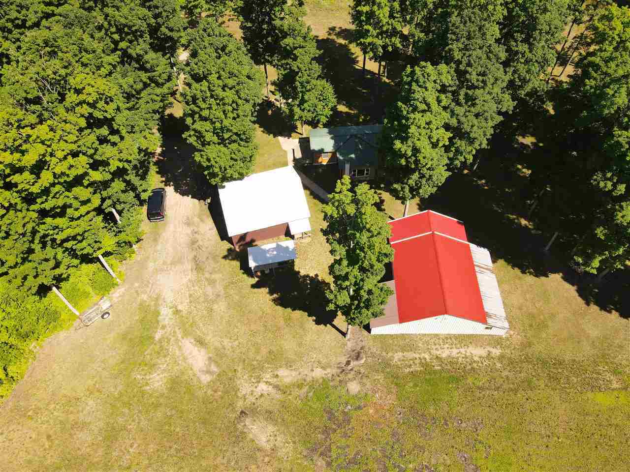 Property Photo:  4030 Mapleway  MI 49659 